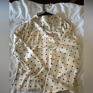 Satin blouse from H&M with Polka dot designing in size medium.